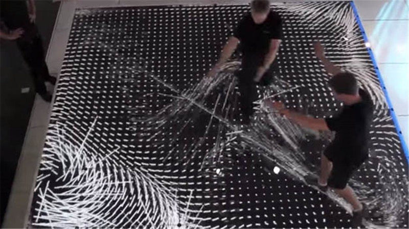 This interactive LED light floor moves with you.